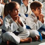 Kids learning Brazilian Jiu-Jitsu in a class.